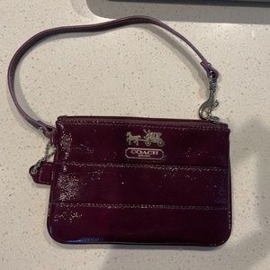 Small purple wrist wallet